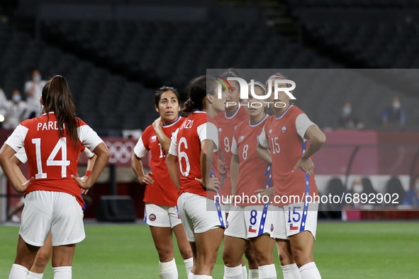 The Chilean team was sad to enter the first goal during the Women's First Round Group E match between Great Britain and Chile during the Tok...