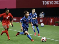 (10)IWABUCHI Mana of Team Japan battles for possession with (10)LAWRENCE Ashle of Team Canada during the Women's First Round Group E match b...