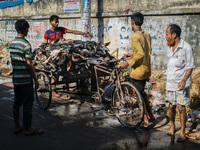 Workers are handling rawhide without any sort of protective equipment. This may cause cancer in the long run. On July 22, 2021 in Dhaka, Ban...
