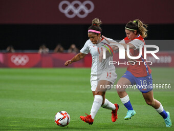 (11) Desiree SCOTT of Team Canada battles for possession with (16) Rosario BALMACEDA of Team Chile during the Women's First Round Group E ma...
