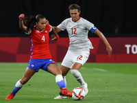(12) Christine SINCLAIR of Team Canada battles for possession with (4) Francisca LARA of Team Chile during the Women's First Round Group E m...