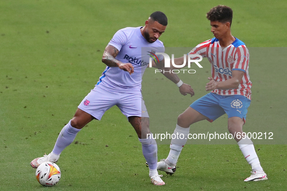 Ilyas Saira and Memphis Depay during the friendly match between FC Barcelona and Girona FC, played at the Johan Cruyff Stadium on 24th July...
