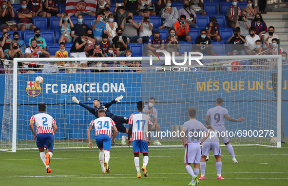 Memphis Depay scores a penalty during the friendly match between FC Barcelona and Girona FC, played at the Johan Cruyff Stadium on 24th July...