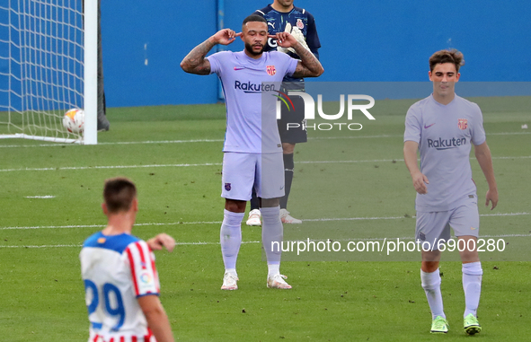 Memphis Depay goal celebration during the friendly match between FC Barcelona and Girona FC, played at the Johan Cruyff Stadium on 24th July...