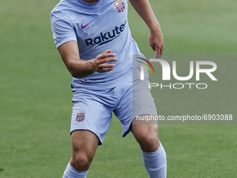 Sergiño Dest of Barcelona in action during the pre-season friendly match between FC Barcelona and Girona FC at Estadi Johan Cruyff on July 2...