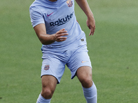 Sergiño Dest of Barcelona in action during the pre-season friendly match between FC Barcelona and Girona FC at Estadi Johan Cruyff on July 2...