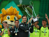 Sebastian Coates of Sporting CP with Winner Trophy during the Pre-Season Friendly match Cinco Violinos Trophy between Sporting CP and Olympi...
