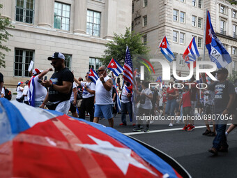 Thousands of demonstrators march from the White House to the Cuban Embassy in Washington, D.C. on July 26, 2021 (