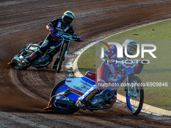 Jake Knight (White) leads Connor King (Yellow) during the National Development League match between Belle Vue Colts and Eastbourne Seagulls...