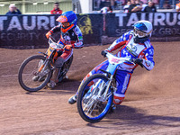 Jake Knight  (White) inside Connor Coles  (Blue)  during the National Development League match between Belle Vue Colts and Eastbourne Seagul...