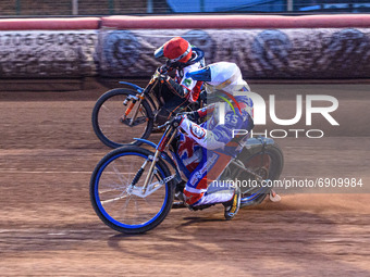  Jack Smith (Red) passes Jake Knight  (White) on the outside during the National Development League match between Belle Vue Colts and Eastbo...