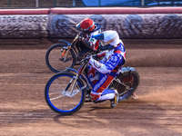  Jack Smith (Red) passes Jake Knight  (White) on the outside during the National Development League match between Belle Vue Colts and Eastbo...