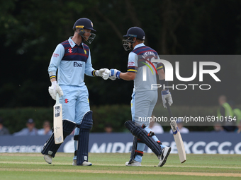 Graham Clark of Durham (l) fist bumps Scott Borthwick of Durham during the Royal London One Day Cup match between Middlesex County Cricket C...