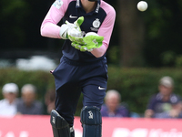 Robbie White of Middlesex in wicketkeeping action during the Royal London One Day Cup match between Middlesex County Cricket Club and Durham...