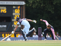 Sam Robson of Middlesex attempts to run out David Bedingham of Durham during the Royal London One Day Cup match between Middlesex County Cri...