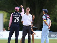 Peter Handscomb of Middlesex (l) tosses the coin as Scott Borthwick of Durham looks on during the Royal London One Day Cup match between Mid...