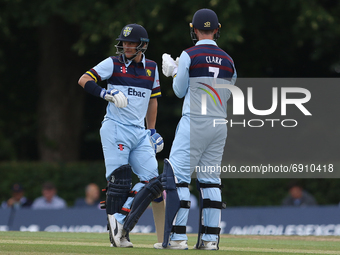 Scott Borthwick of Durham (l) talks to Graham Clark of Durham during the Royal London One Day Cup match between Middlesex County Cricket Clu...