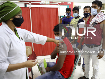A Migrant worker receives a dose of the Moderna vaccine against the Covid-19 coronavirus in Dhaka, Bangladesh on July 27, 2021.  (