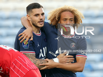 Mauro Icardi of Paris Saint Germain and Xavi Simons of Paris Saint Germain celebrate a goal during the pre-season friendly match between Sev...
