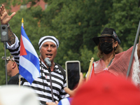 Hundred of cubans across the country gathering at Lafayette Park to demand President Biden provide humanitarian help and military interventi...