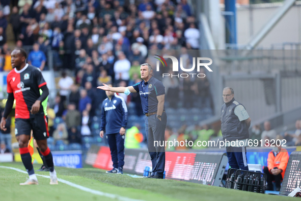 Tony Mowbray, Blackburn manager, shouts, watched on by Marcelo Bielsa during the Pre-season Friendly match between Blackburn Rovers and Leed...