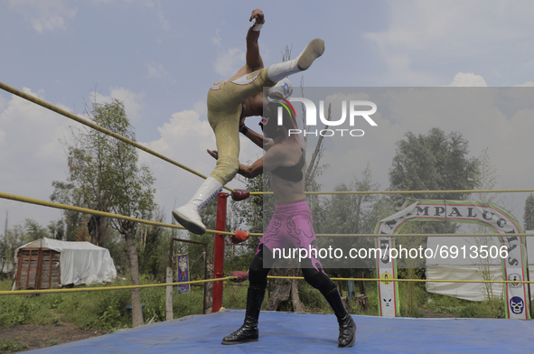 Gran Felipe Jr. and Sol, professional wrestlers, during a wrestling match where they went head to head with other gladiators in a ring at th...