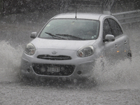 A car in heavy rain in Mexico City where there were several puddles in the Coyoacán, Tlalpan, Xochimilco and Álvaro Obregón districts during...