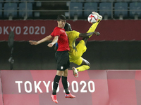 (4) Osama GALAL of Team Egypt is challenged by (14) Thomas DENG of Team Australia during the Men's Group C match between Australia and Egypt...