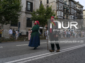 A couple in typical Cantabrian costume parade through the streets of Santander to commemorate Institutions Day, which is considered the orig...