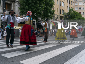 A group of young people dressed in typical Cantabrian costumes dance regional dances through the streets of Santander to commemorate the Day...