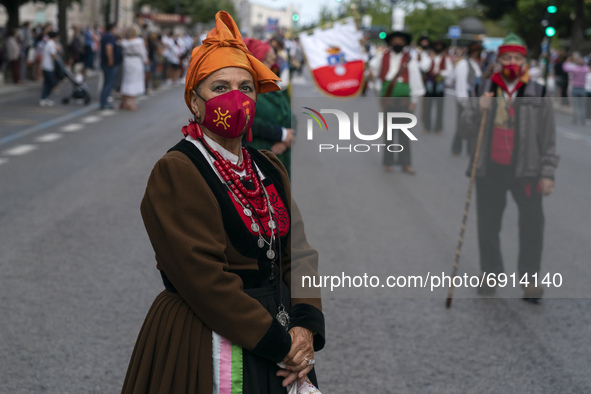 Groups of people parade dressed in typical Cantabrian costumes through the streets of Santander to commemorate Institutions Day, which is co...