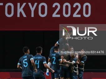 (14) Facundo Medina of Team Argentina celebrates with teammates after scoring their side's first goal during the Men's First Round Group C m...
