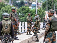 Indian army soldiers, CRPF and Jammu Kashmir police near the site where militants lobbed Grenade on security forces in which 2 CRPF Jawans a...