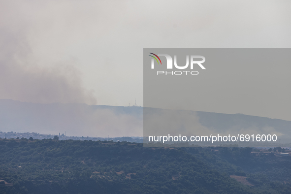 29/07/2021 Cuggioni, Oristano  Italy.
 The wildfires not yet completely extinguished create small fires visible from the surrounding hills....