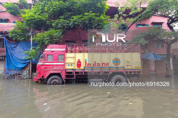 An Indane LPG gas cylinder truck stands stranded in  flood water , caused due to 72 hours of continuous torrential rain in Kolkata , India ,...