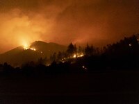Night Images of  the wildfire burring pine forest and olive groves on the hills of Evia in Greece, on August 4, 2021. The area of the fires...