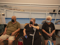 A ferry is hosting people who can't evacuate in the Pefki village, in Evia Island, Greece, on August 8, 2021. Some people are staying in the...
