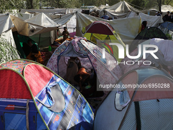 Thousands of displaced families suffer hardships in a park in Kabul, Afghanistan, on August 11, 2021. Around 30,000 families were displaced...