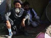 Thousands of displaced families suffer hardships in a park in Kabul, Afghanistan, on August 11, 2021. Around 30,000 families were displaced...