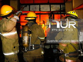 Fire volunteers responded on a 3rd alarm fire hits in public market of Teresa in Rizal, Philippines on night of August 11, 2021. Despite of...