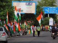 A man sells Indian national flags along a road, ahead of India's 75th Independence day celebrations, in New Delhi, India on August 13, 2021....
