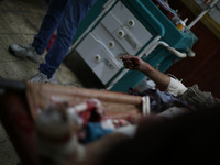 
A hand of an injured man inside a field hospital after what activists said was mortar shelling by forces of Syria's President Bashar al-As...