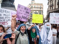 Protesters are seen with the burqa removed.Around a hundred women have participated in a feminist demonstration in front of the United Nati...