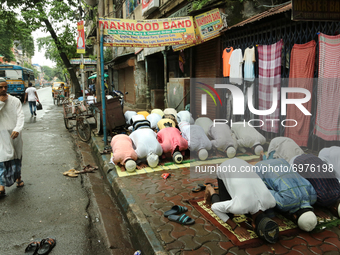 Muslim men offer Friday prayers on the Street Side Footpath in Kolkata on August 20,2021. (