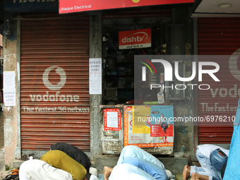 Muslim men offer Friday prayers in front of Mobile Store  in Kolkata on August 20,2021. (