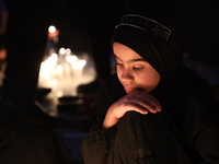 Muslims commemorate the night of loneliness (Lailatul Wahsha) in Karbala, Iraq, on August 17, 2021 by lighting candles as an expression of s...
