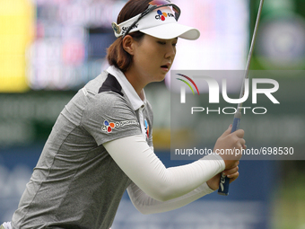 Kyu-Jung Baek of Gumi, South Korea reacts to her putt on the 17th green during the third round of the Marathon LPGA Classic golf tournament...