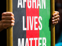 A banner 'Afghan Lives Matter' is seen during a protest In Solidarity With Afghanistan in front of the U.S. Consulate General in Krakow, Pol...