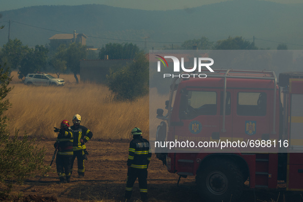Greek and Romanian firefighters guarding Profitis Ilias village, during the Vilia wildfire.  On August 23rd, in 2021 in Vilia, Attica (Athen...