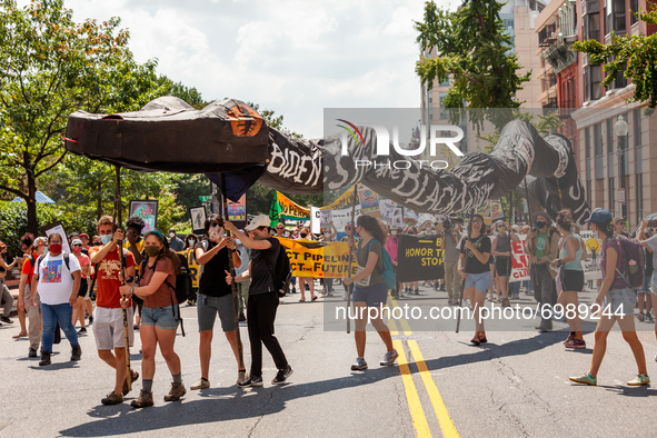 A march against Enbridge's Line 3 oil pipeline, sponsored by Shut Down DC and Extinction Rebellion, makes its way through downtown.  The pip...
